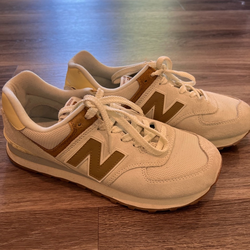 New Balance Cream and Gold Sneakers